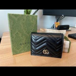 Barely used black Gucci wallet